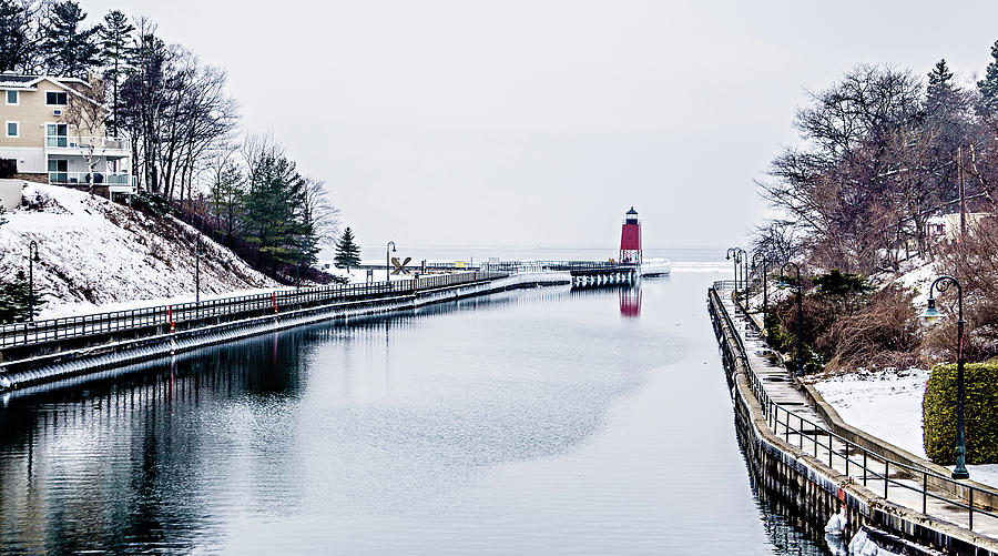 town of Charlevoix and South Pier Lighthouse on lake michigan #1 Photograph by Alex Grichenko
