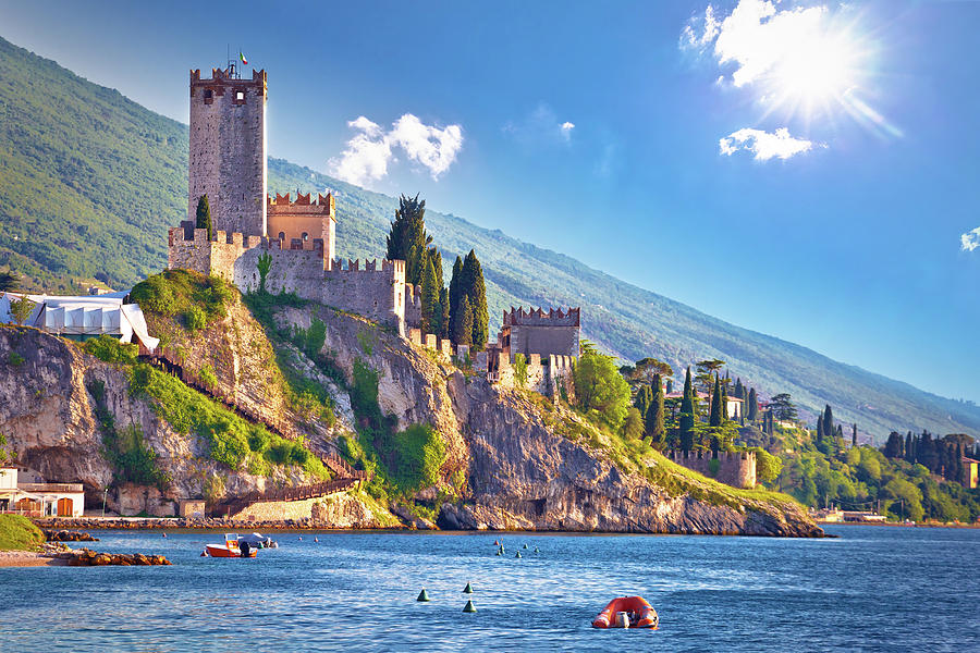 Town of Malcesine castle and waterfront view #1 Photograph by Brch Photography