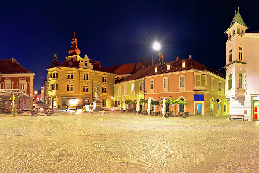 Town of Ptuj historic main square panoramic evening view #1 Photograph by Brch Photography