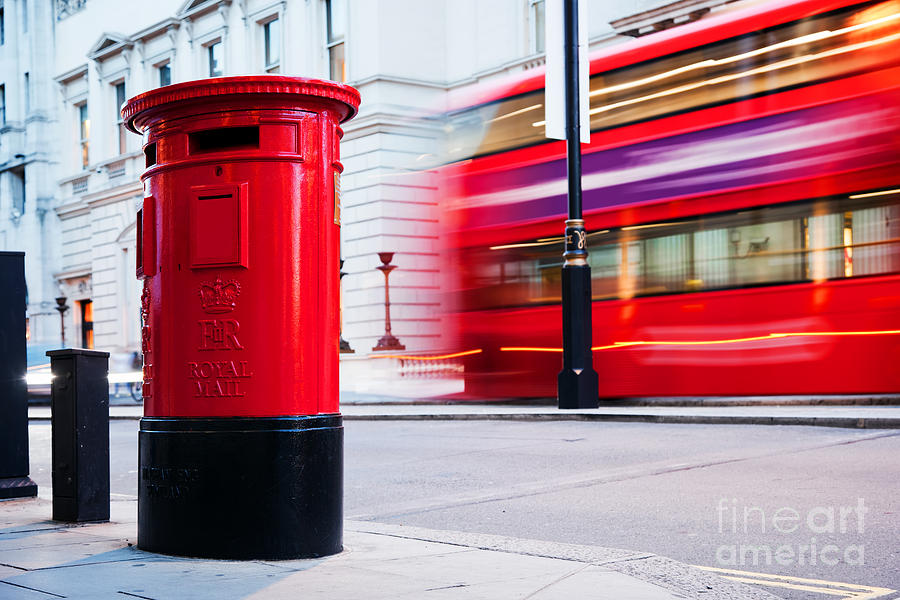 Traditional red mail letter box and red bus in motion in London, the UK Photograph by Michal Bednarek - Pixels