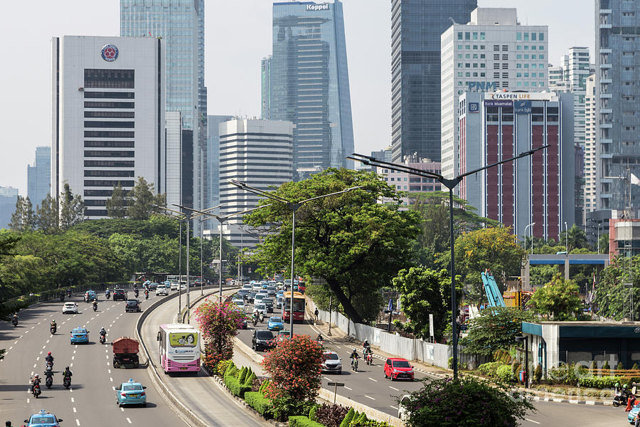 Traffic along Sudirman avenue in Jakarta, Indonesia capital city #1 Photograph by Didier Marti