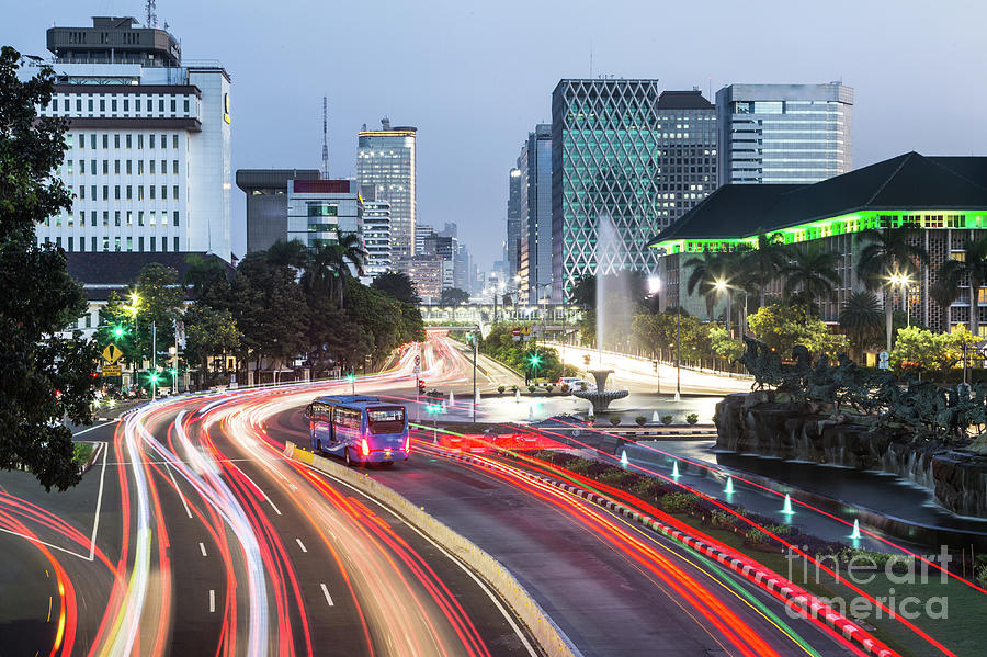 Traffic rush in Jakarta at night #1 Photograph by Didier Marti