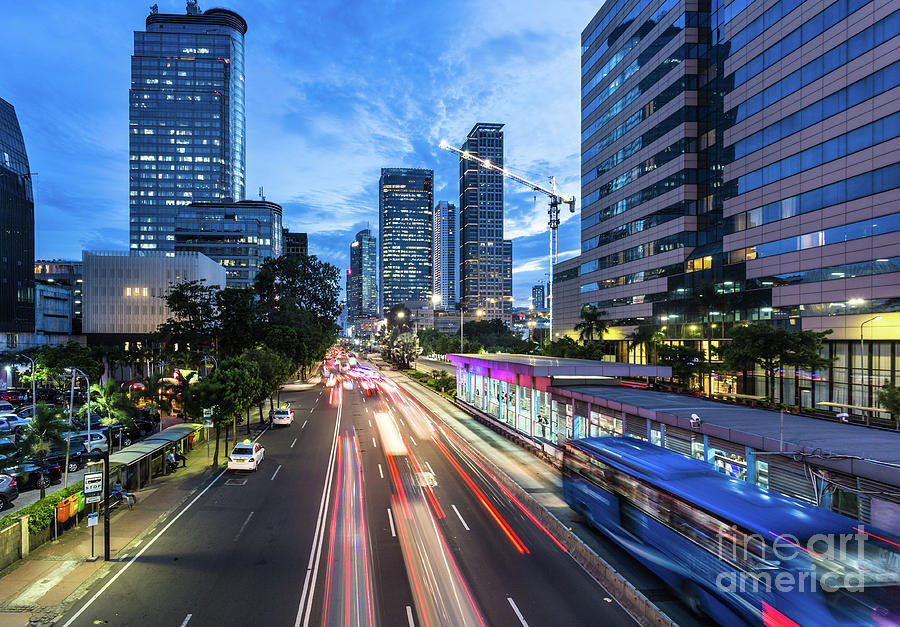Traffic rushing in Jakarta business district in Indonesia capita #1 Photograph by Didier Marti