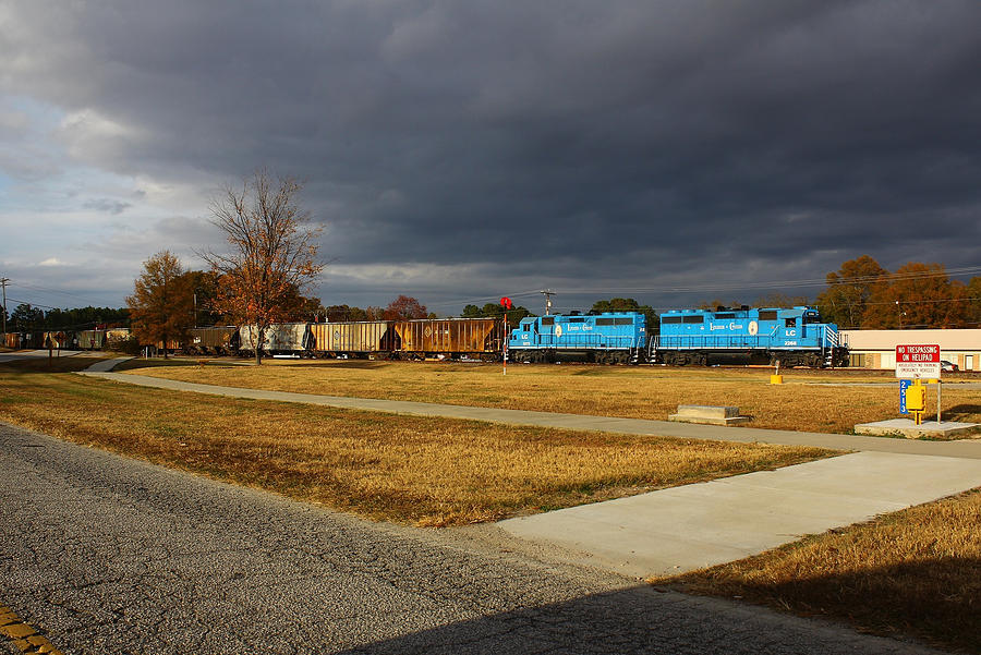 Train Under An Angry Sky #2 Photograph by Joseph C Hinson