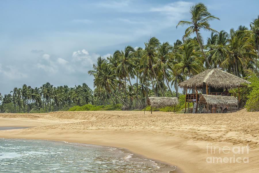 Tropical beach with low key restaurant Photograph by Patricia Hofmeester