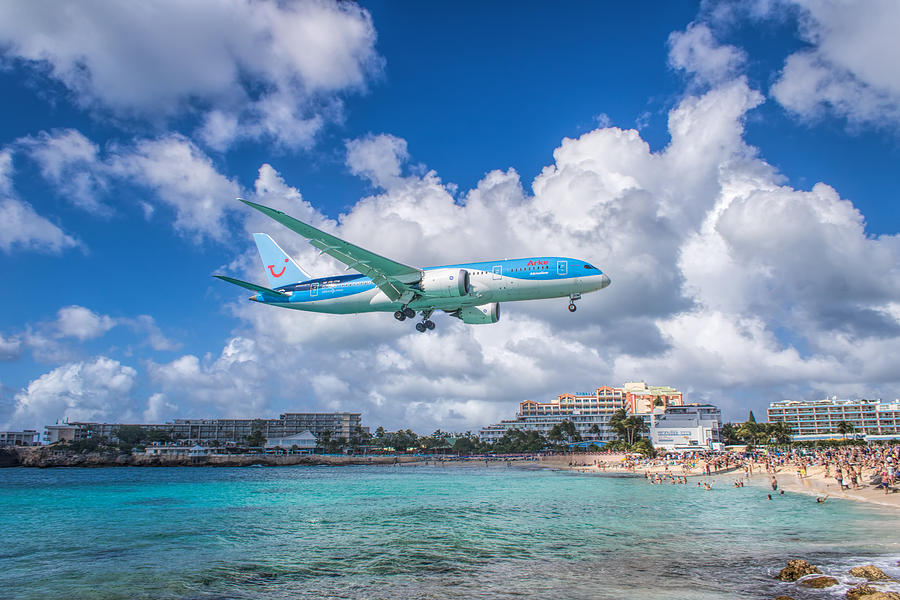 TUI Airlines Netherlands landing at St. Maarten airport. #1 Photograph by David Gleeson