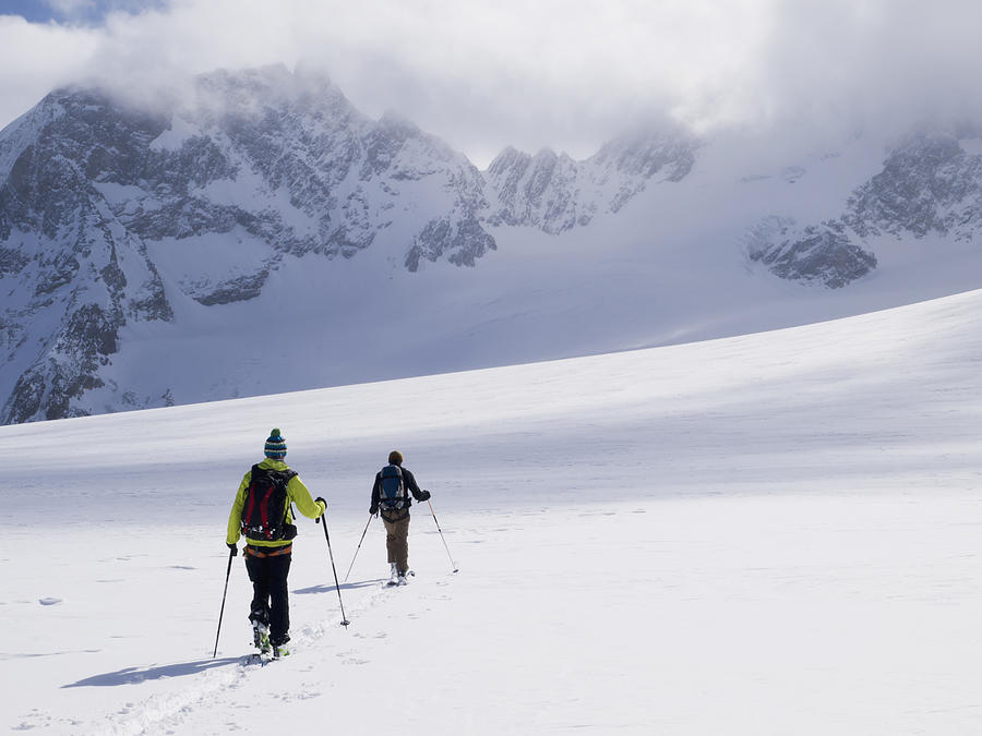 Two Skiers Ski Touring Photograph by Penny Kendall - Fine Art America