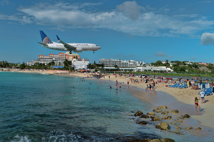 United Airlines landing at St. Maarten airport #1 Photograph by David Gleeson