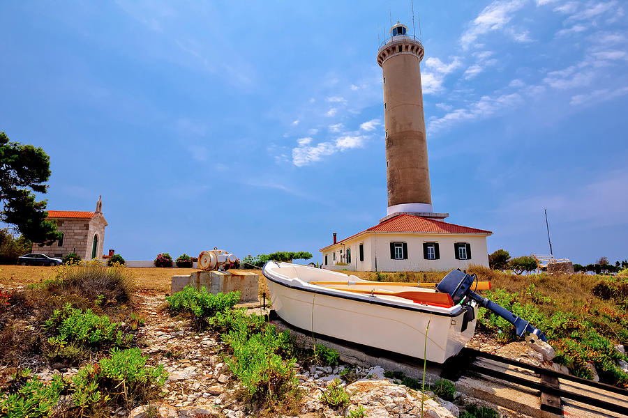 Veli Rat lighthouse and boat extraction tracks #1 Photograph by Brch Photography