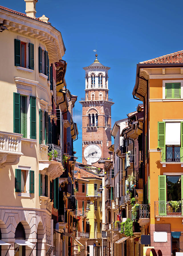 Verona colorful street and Lamberti tower view #1 Photograph by Brch Photography