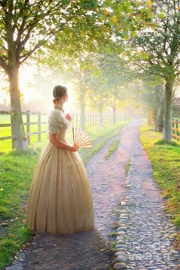 Victorian Woman On A Rural Path At Sunset #1 Photograph by Lee Avison