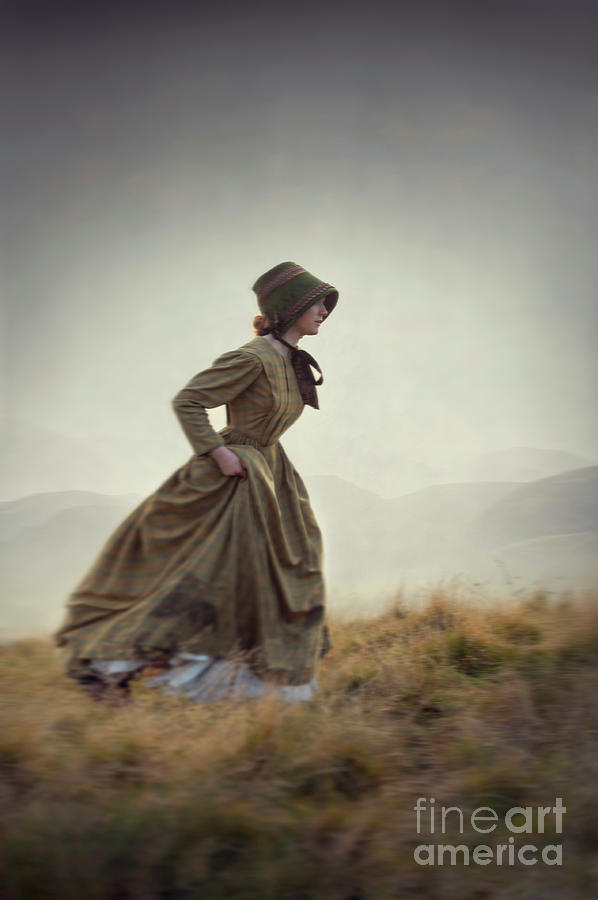 Victorian Woman Running On The Misty Moors #1 Photograph by Lee Avison