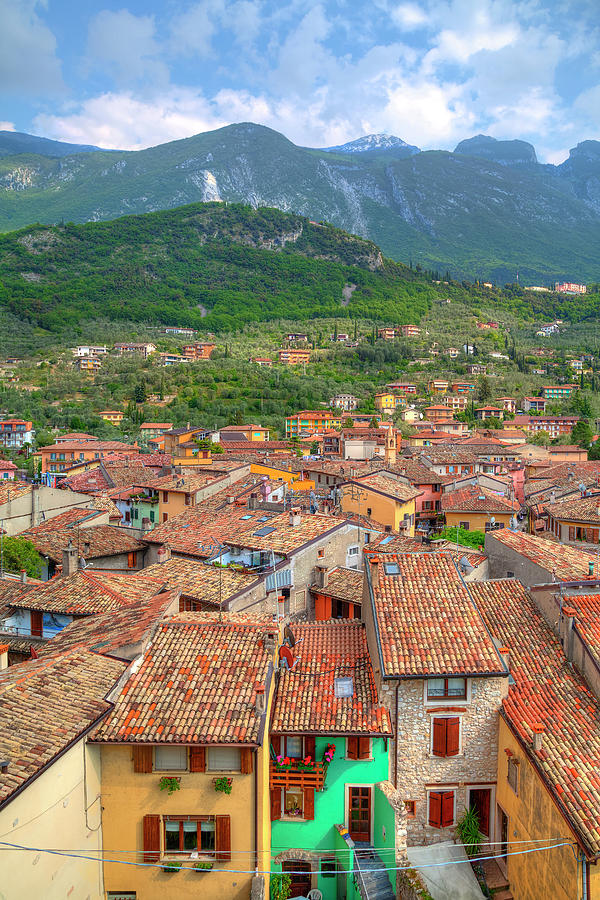 view over the red roofs of Malcesine at the east bank of the Lake Garda #1 Photograph by Gina Koch