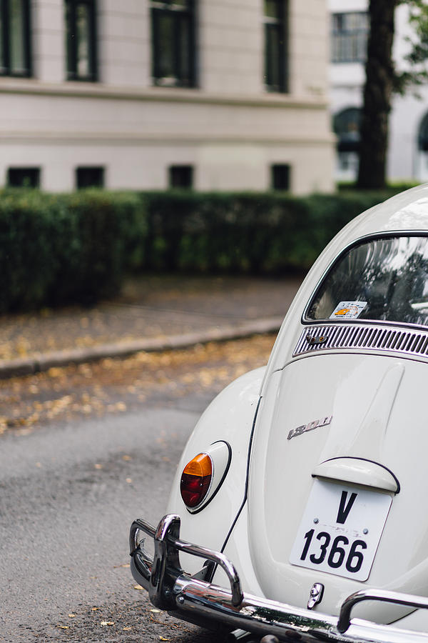 Cool Photograph - Volkswagen Beetle retro car at the city street #1 by Aldona Pivoriene