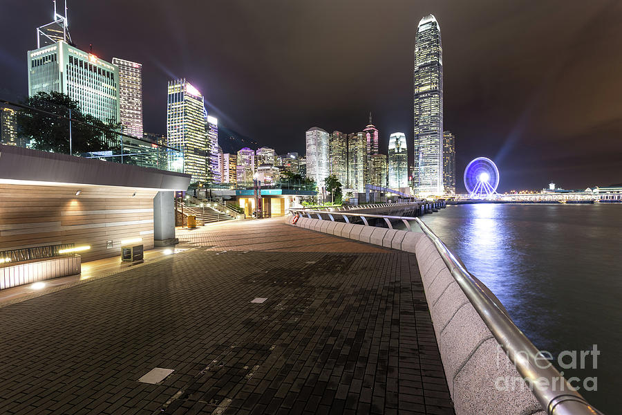 Waterront promenade along the Victoria harbour in Hong Kong  #1 Photograph by Didier Marti