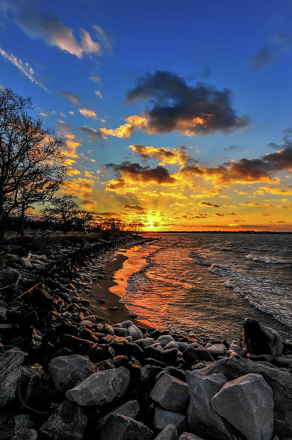 Winter sunset on a Chesapeake Bay beach #1 Photograph by Patrick Wolf
