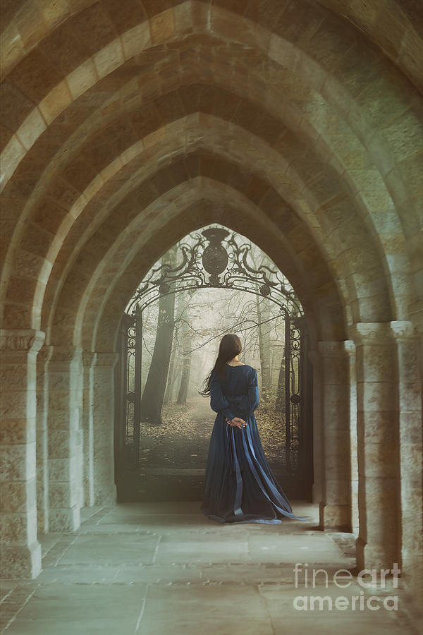 Woman in blue dress walking in hallway  #1 Photograph by Sandra Cunningham