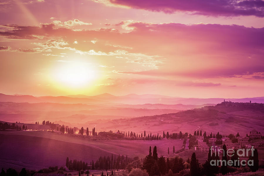 Wonderful Tuscany landscape with cypress trees, farms and medieval towns, Italy. Pink and purple sunset #1 Photograph by Michal Bednarek