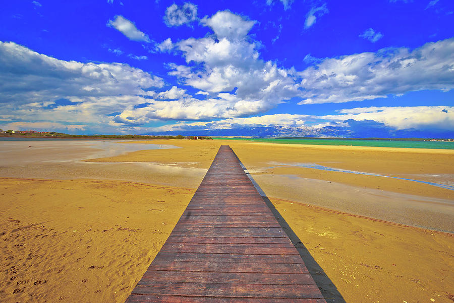 Wooden boardwalk and sand beach of Nin #1 Photograph by Brch Photography