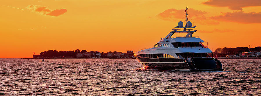 Yachtig on open sea at golden sunset panoramic view #1 Photograph by Brch Photography