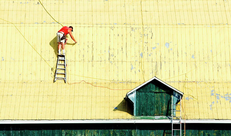Yellow Barn Roof Workers-5 #1 Photograph by Steve Somerville
