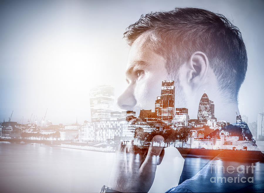 Young businessman thinking. Double exposure city background. #1 Photograph by Michal Bednarek
