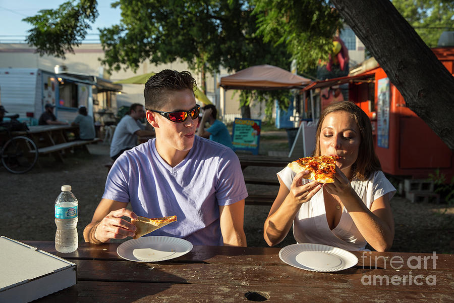 Couple Photograph - Young couple enjoys food at an Eastside food trailer park East Austins East 6th Street offers the Best Food Trucks Austin #1 by Dan Herron