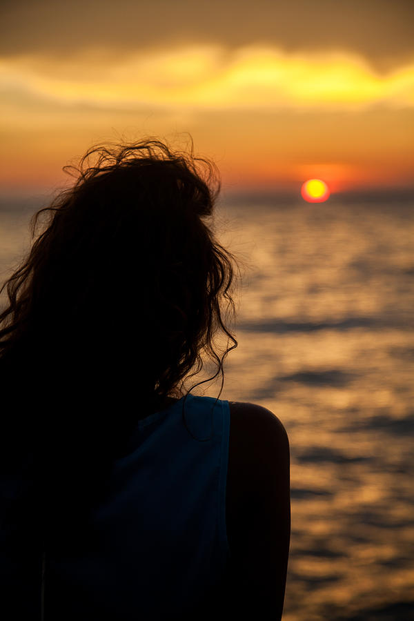 Free Photo | Back view of woman in yoga pose during sunset