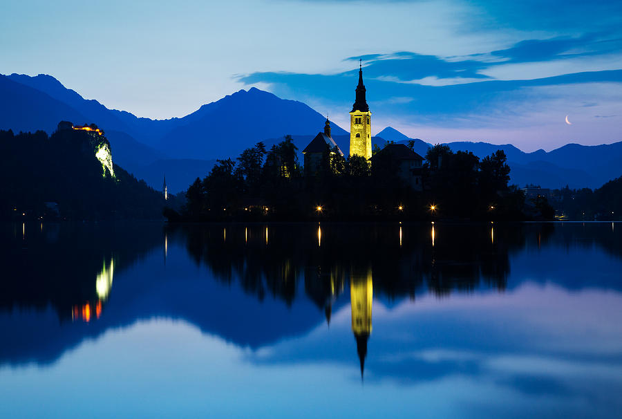 Dawn breaks over Lake Bled Photograph by Ian Middleton