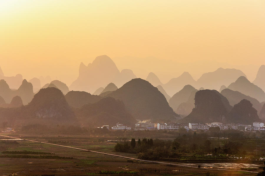 Karst mountains scenery in sunset #10 Photograph by Carl Ning