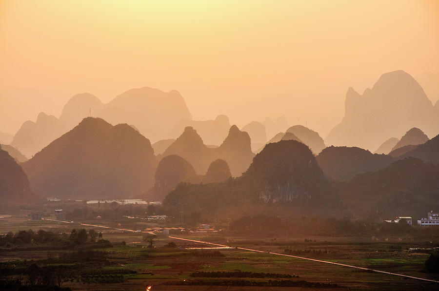 Karst mountains scenery in sunset #11 Photograph by Carl Ning