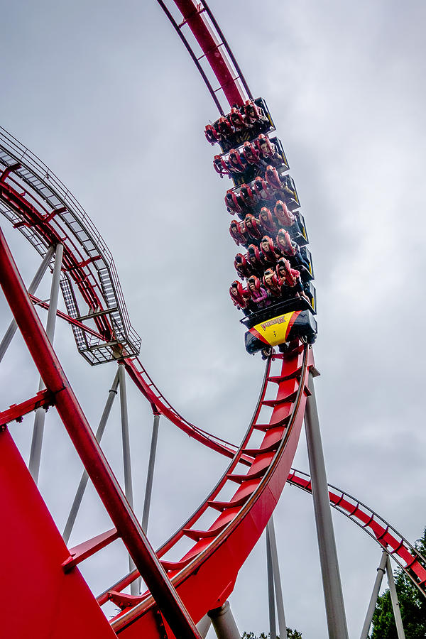 Crazy Rollercoaster Rides At Amusement Park Photograph by Alex ...