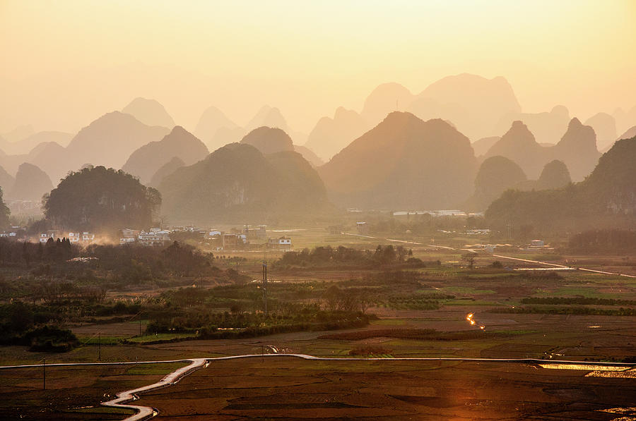 Karst mountains scenery in sunset #12 Photograph by Carl Ning