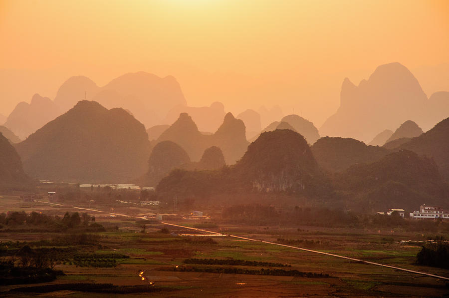Karst mountains scenery in sunset #13 Photograph by Carl Ning