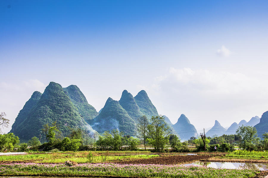 Karst mountains and rural scenery #14 Photograph by Carl Ning