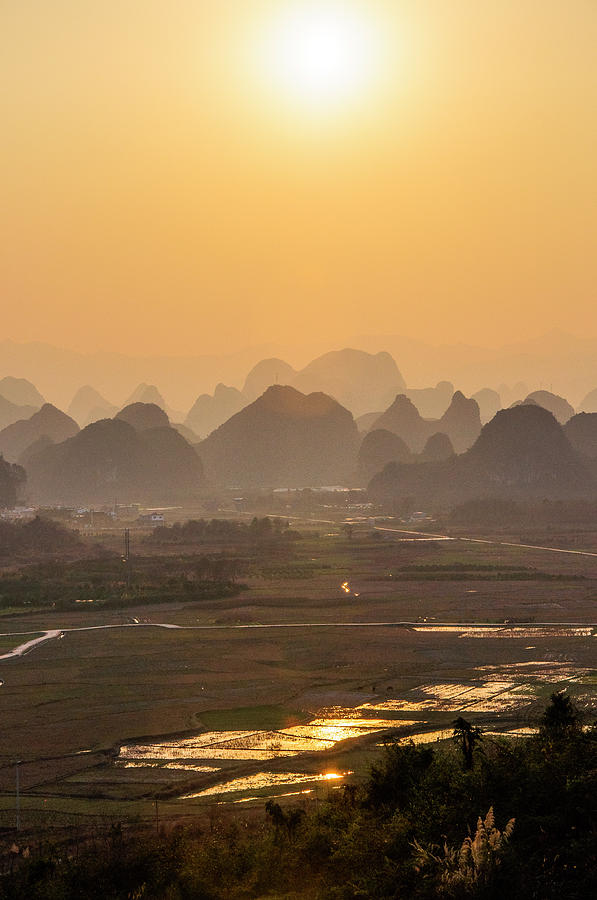 Karst mountains scenery in sunset #14 Photograph by Carl Ning