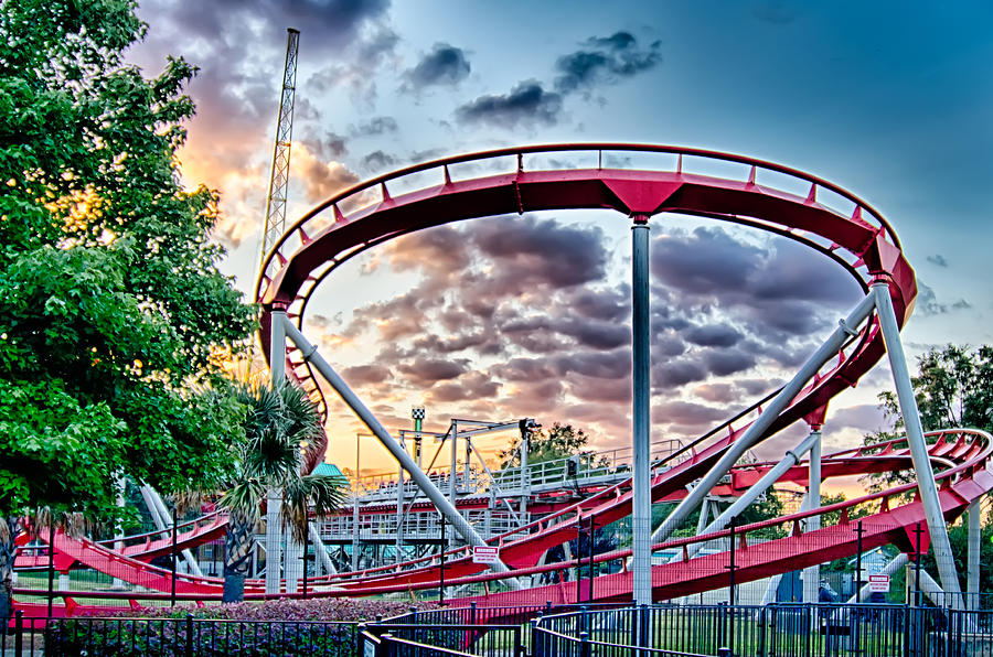 Crazy Rollercoaster Rides At Amusement Park Photograph