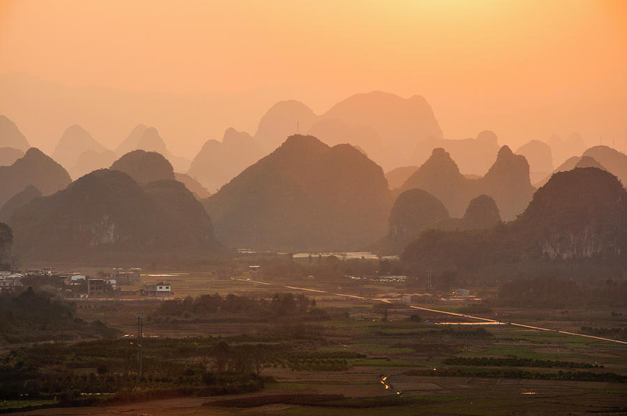 Karst mountains scenery in sunset #15 Photograph by Carl Ning