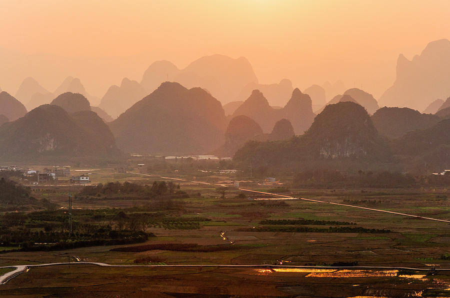 Karst mountains scenery in sunset #16 Photograph by Carl Ning