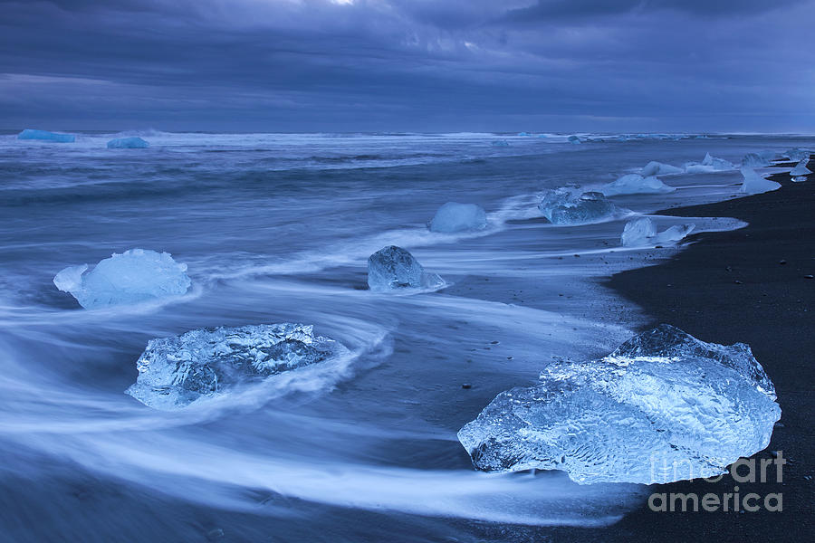 Melting ice Photograph by Arterra Picture Library