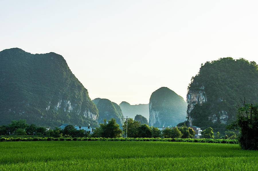 The beautiful karst rural scenery #161 Photograph by Carl Ning