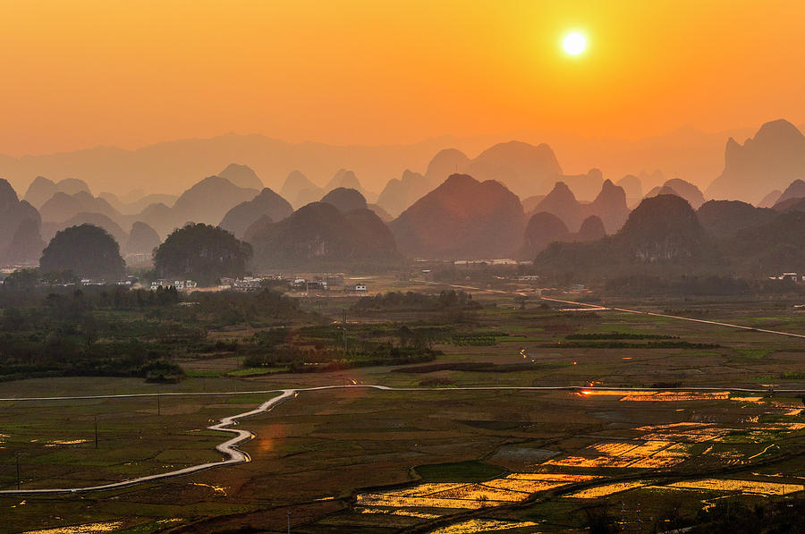 Karst mountains scenery in sunset #17 Photograph by Carl Ning