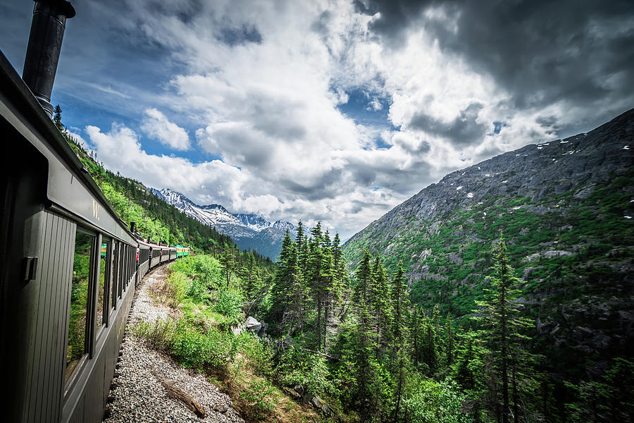 The White Pass and Yukon Route on train passing through vast lan #17 Photograph by Alex Grichenko