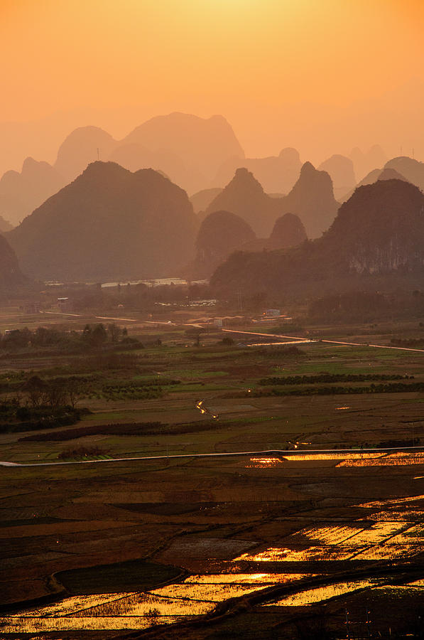 Karst mountains scenery in sunset #18 Photograph by Carl Ning