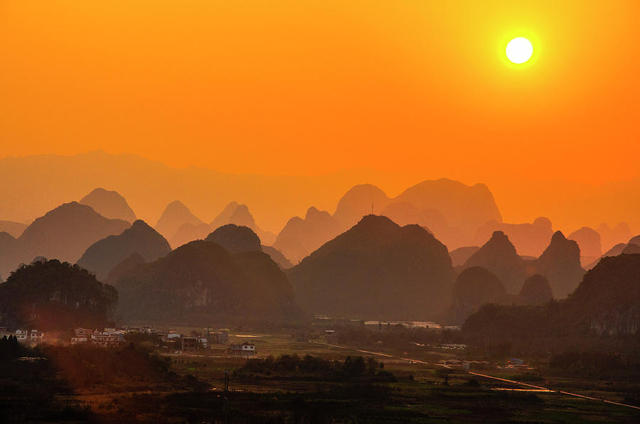 Karst mountains scenery in sunset #19 Photograph by Carl Ning