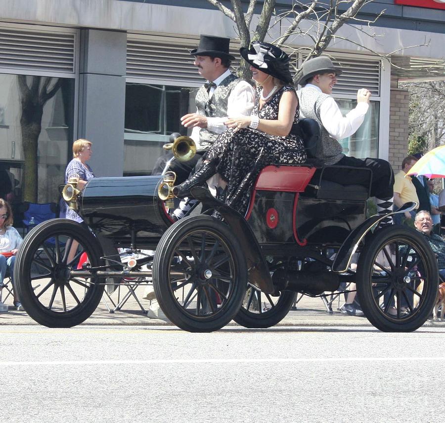 A 1901 Oldsmobile Convertible With Passengers Photograph by John Telfer