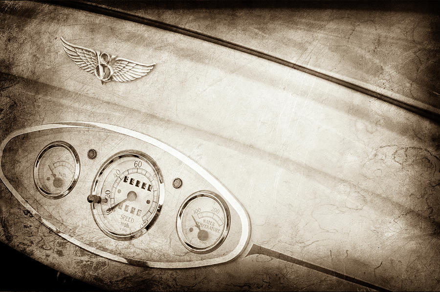 Transportation Photograph - 1929 Ford Model A Roadster Dashboard Emblem -0048s by Jill Reger