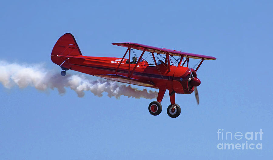 1940 Boeing Stearman Biplane flyby Photograph by Rick Bures