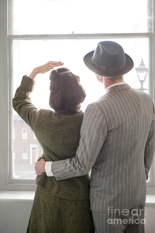 1940s Couple At The Window Photograph by Lee Avison