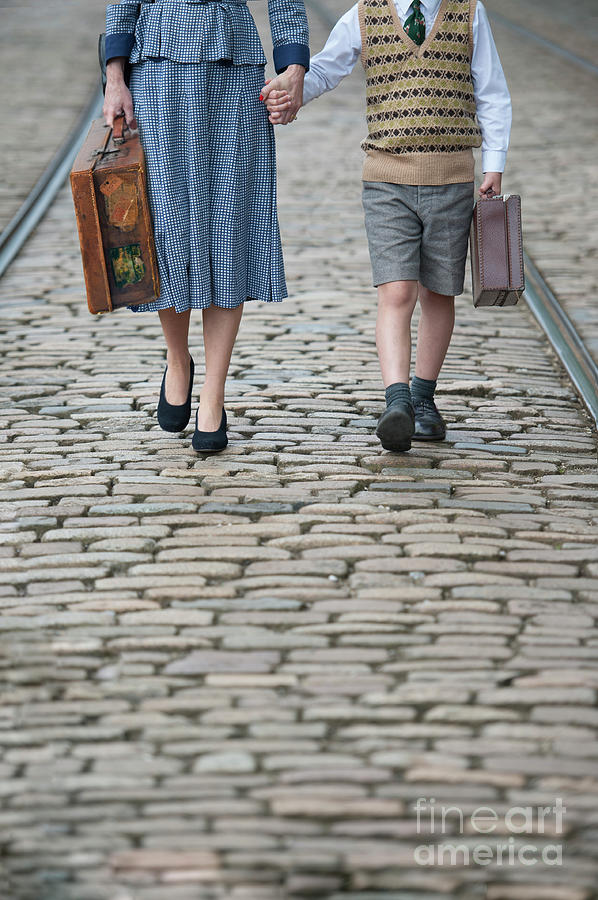 1940s Mother And Son Walking With Luggage Photograph by Lee Avison